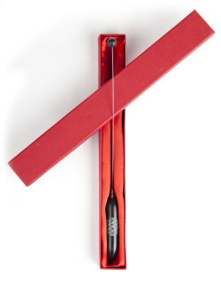 Tensor schwarzer Speckstein mit Lebensblume